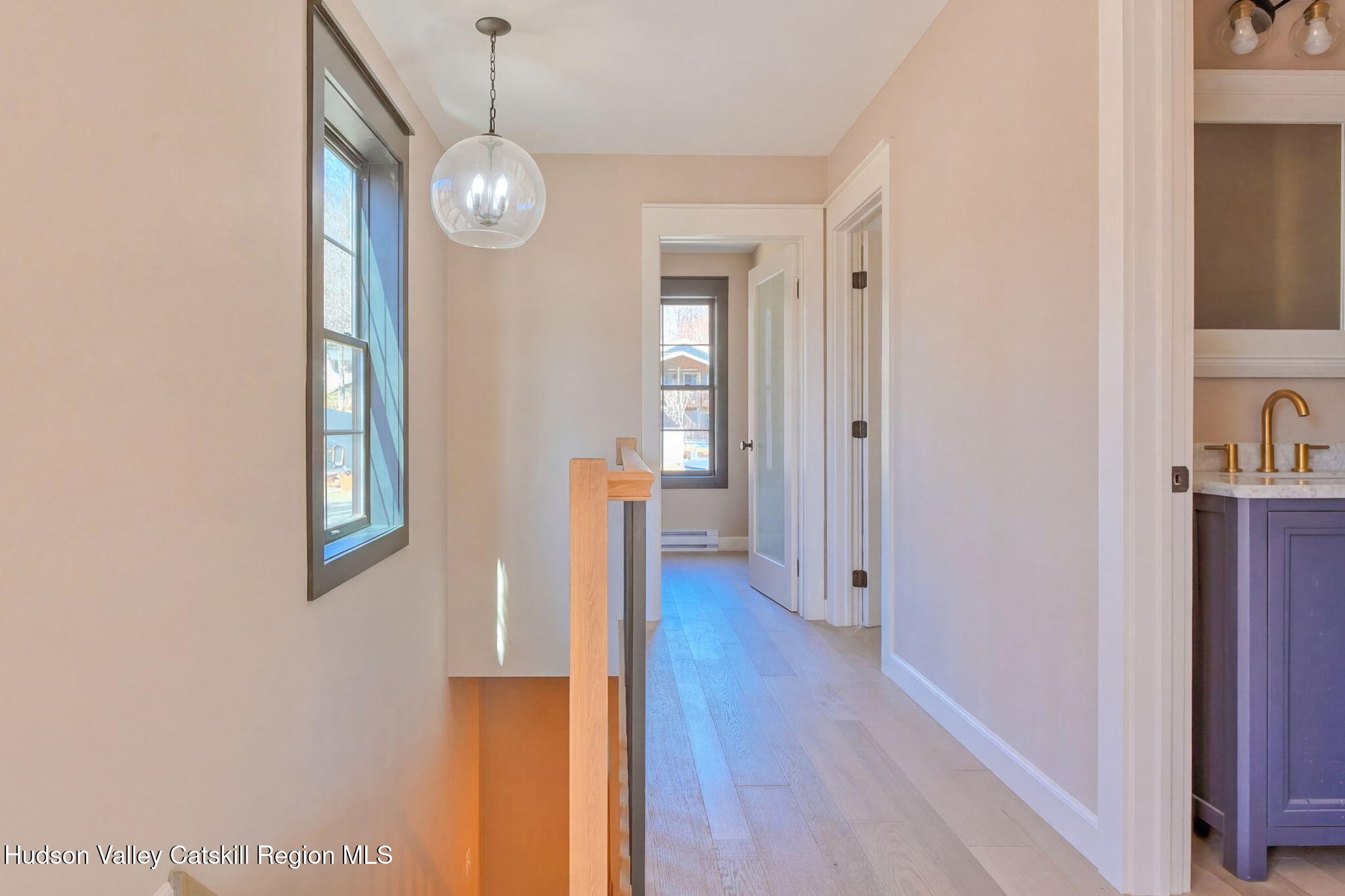 11 Mueller Road Saugerties, NY 12453 - Photo 17 of 36 a view of a hallway with wooden floor and front door