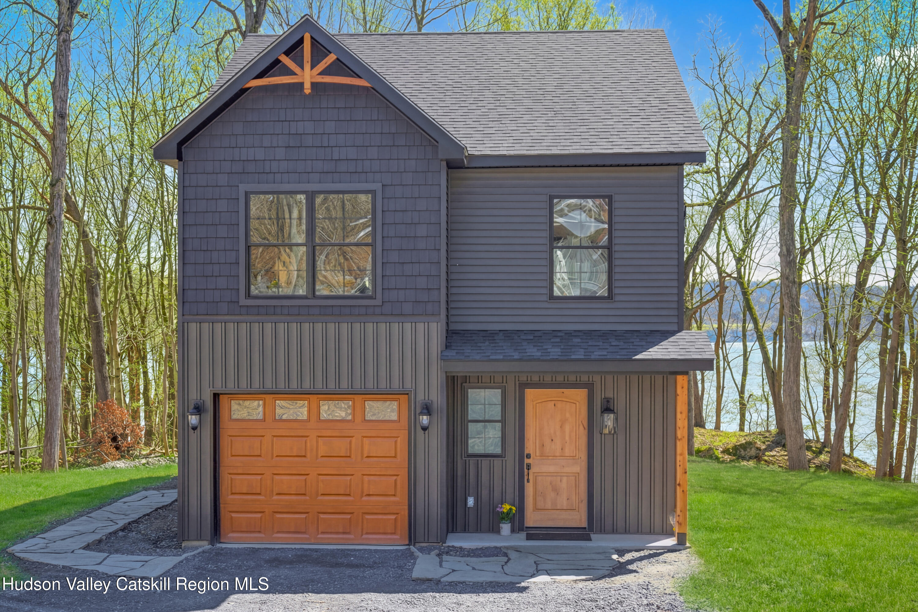 11 Mueller Road Saugerties, NY 12453 - Photo 2 of 36 a front view of a house with garden