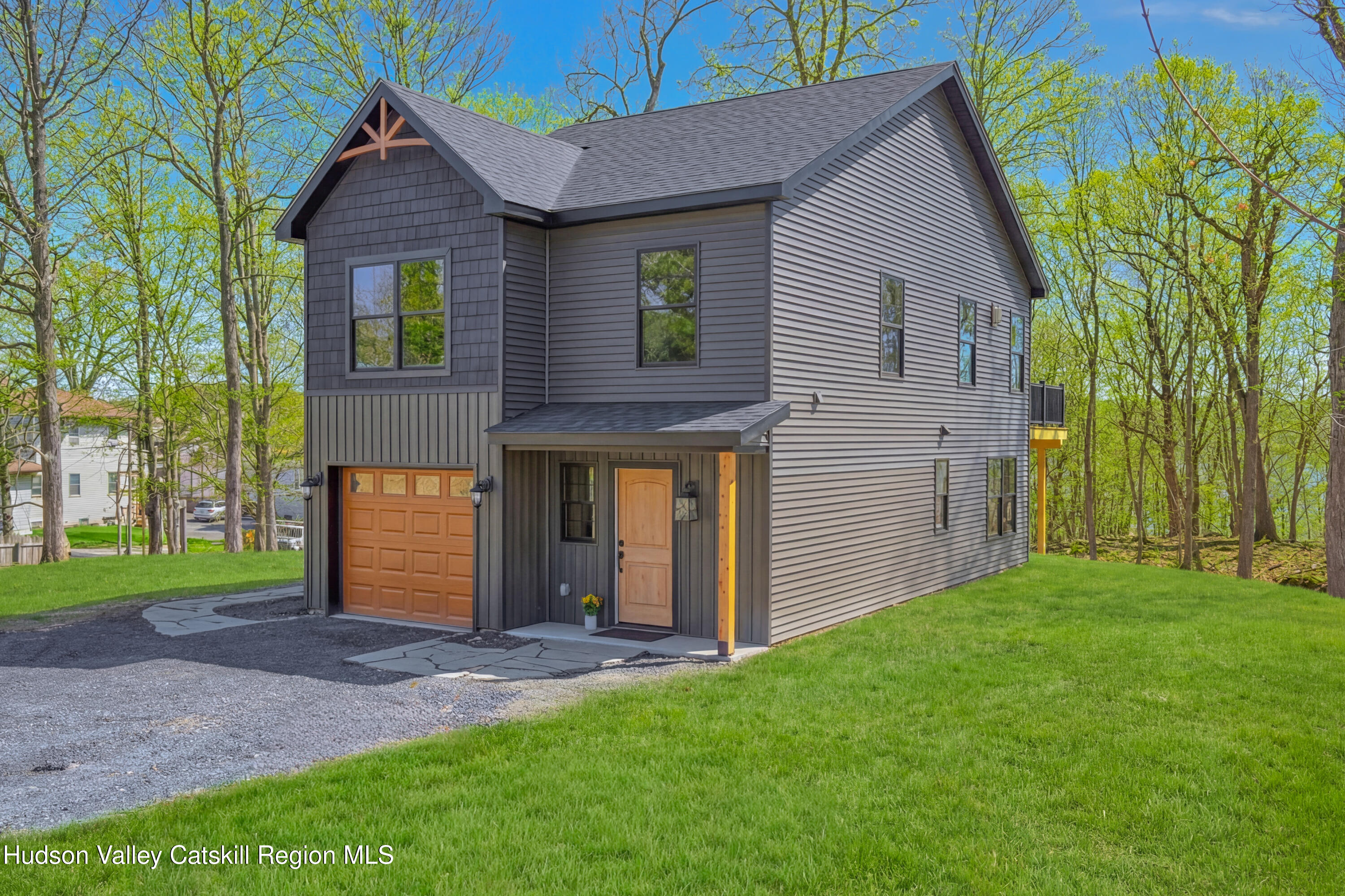 11 Mueller Road Saugerties, NY 12453 - Photo 4 of 36 a front view of a house with a garden