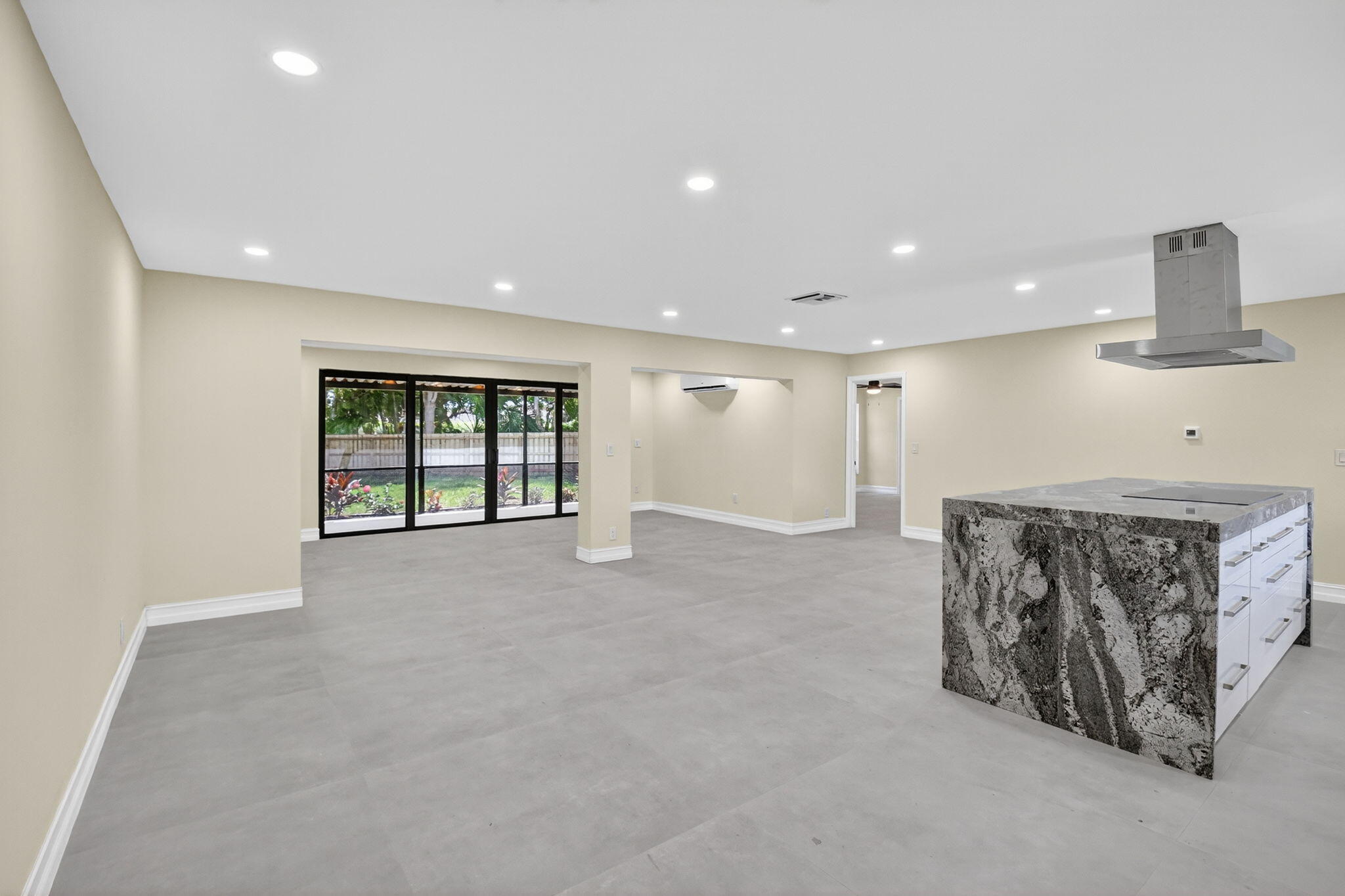 6251 Hitchin Post Way Delray Beach, FL 33484 - Photo 13 of 67 a view of an empty room with a fireplace