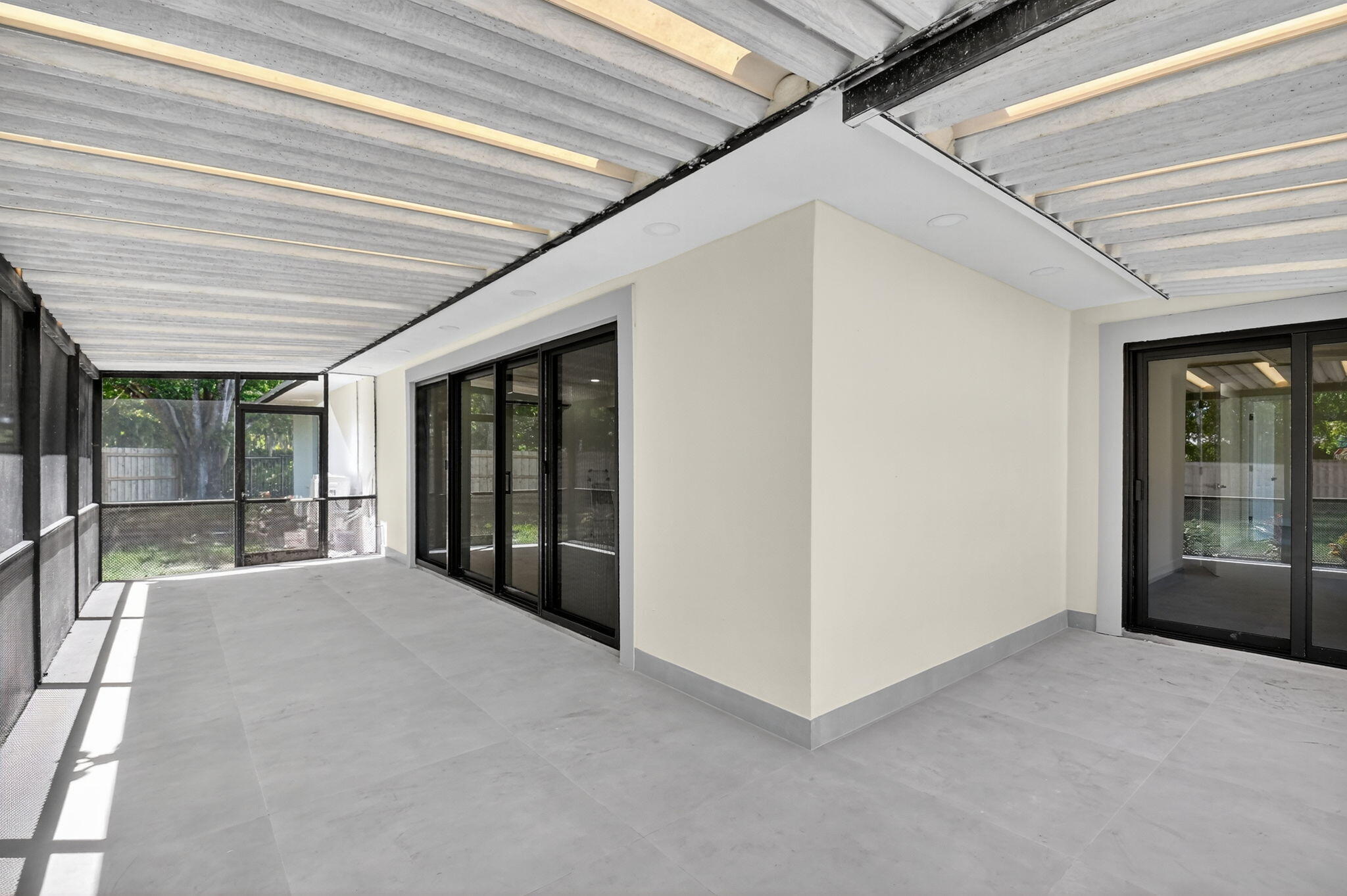 6251 Hitchin Post Way Delray Beach, FL 33484 - Photo 44 of 67 a view of an empty room with a balcony