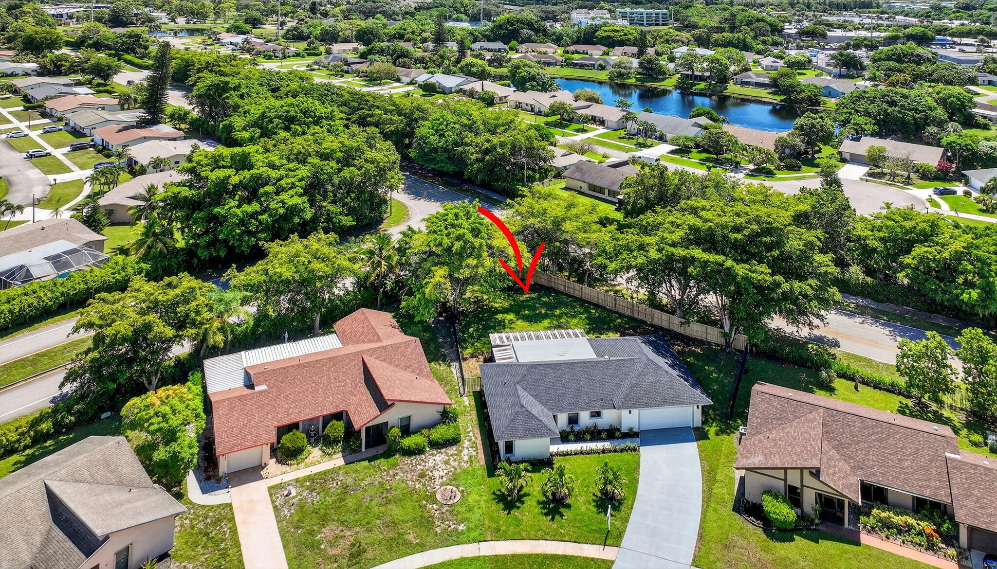 6251 Hitchin Post Way Delray Beach, FL 33484 - Photo 58 of 67 an aerial view of multiple houses with yard