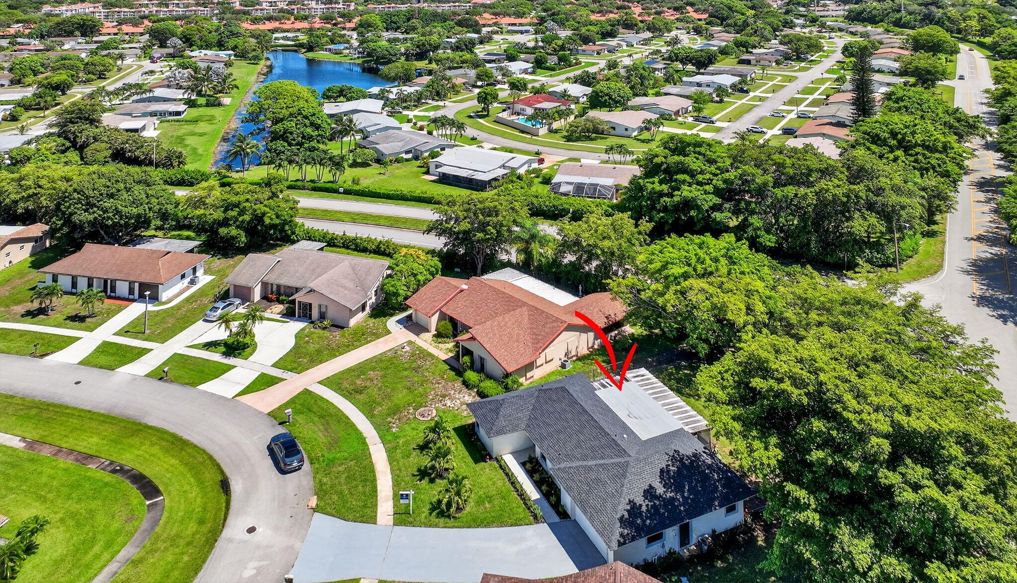 6251 Hitchin Post Way Delray Beach, FL 33484 - Photo 60 of 67 an aerial view of an chairs and umbrellas