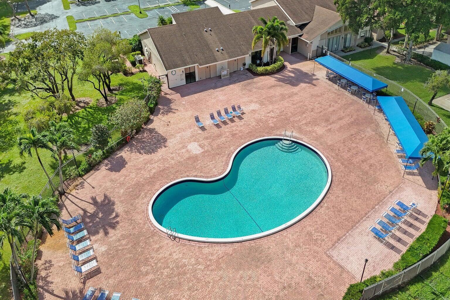 6251 Hitchin Post Way Delray Beach, FL 33484 - Photo 65 of 67 an aerial view of a swimming pool