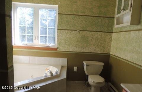 1900 Butte Road Blakeslee, PA 18610 - Photo 14 of 16 a bathroom with a toilet and a sink