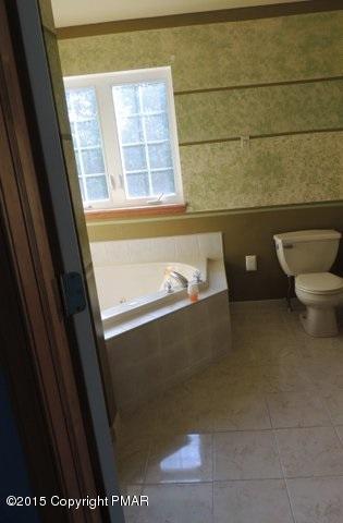 1900 Butte Road Blakeslee, PA 18610 - Photo 9 of 16 a bathroom with a toilet