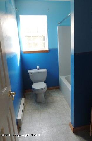 1900 Butte Road Blakeslee, PA 18610 - Photo 10 of 16 a bathroom with a toilet and a shower
