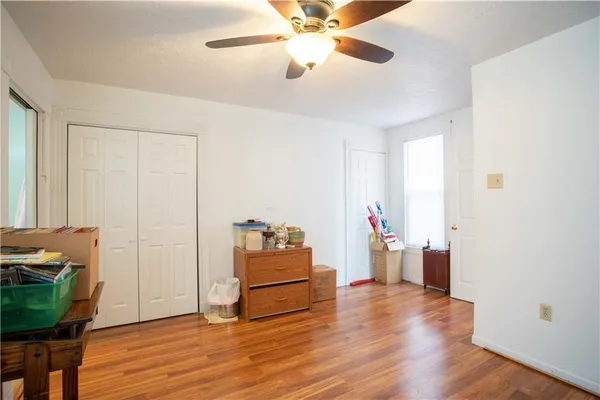 a view of a livingroom with wooden floor