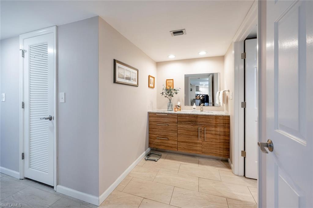 413 Augusta Boulevard, Unit 302 Naples, FL 34113 - Photo 21 of 39 a view of room with bathroom