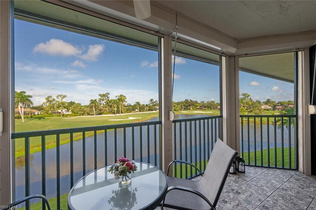 413 Augusta Boulevard, Unit 302 Naples, FL 34113 - Photo 31 of 39 a view of a balcony with furniture