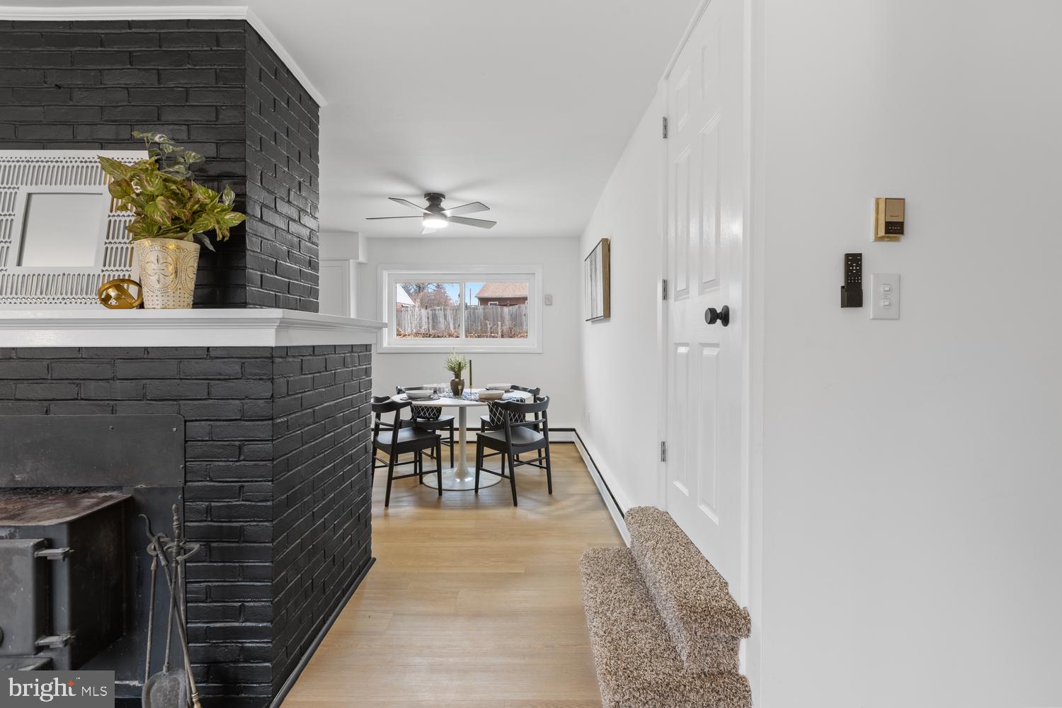 7 Cedarhurst Circle Lancaster, PA 17603 - Photo 5 of 24 a dining room with furniture and a fireplace