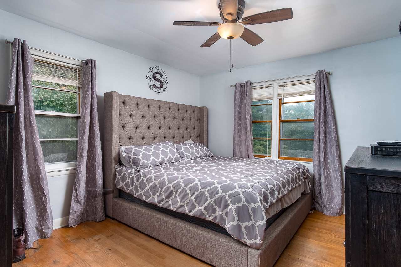 100 Nottingham Road Staunton, VA 24401 - Photo 31 of 50 a bedroom with a large bed and a window