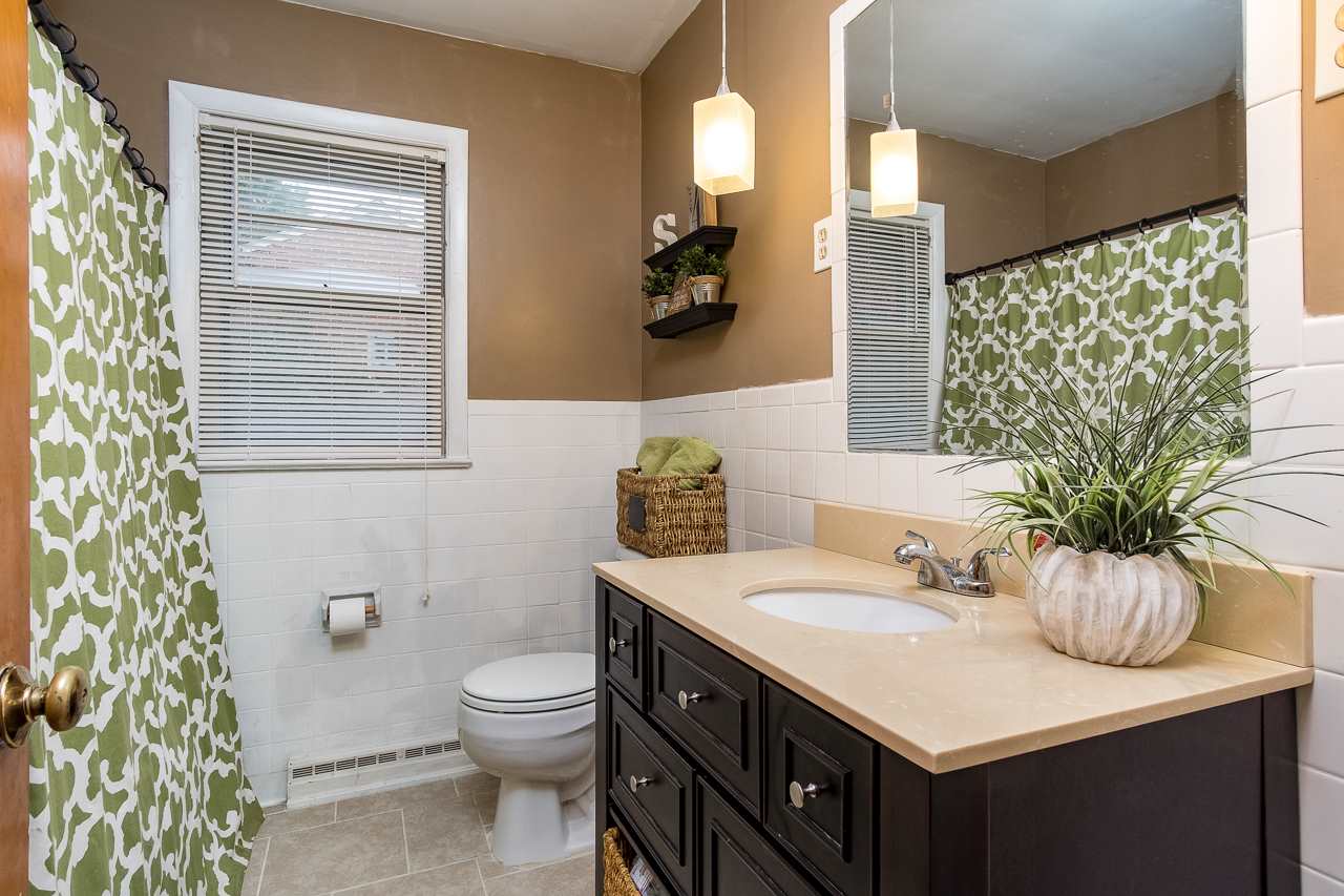 100 Nottingham Road Staunton, VA 24401 - Photo 33 of 50 a bathroom with a sink a toilet and a mirror