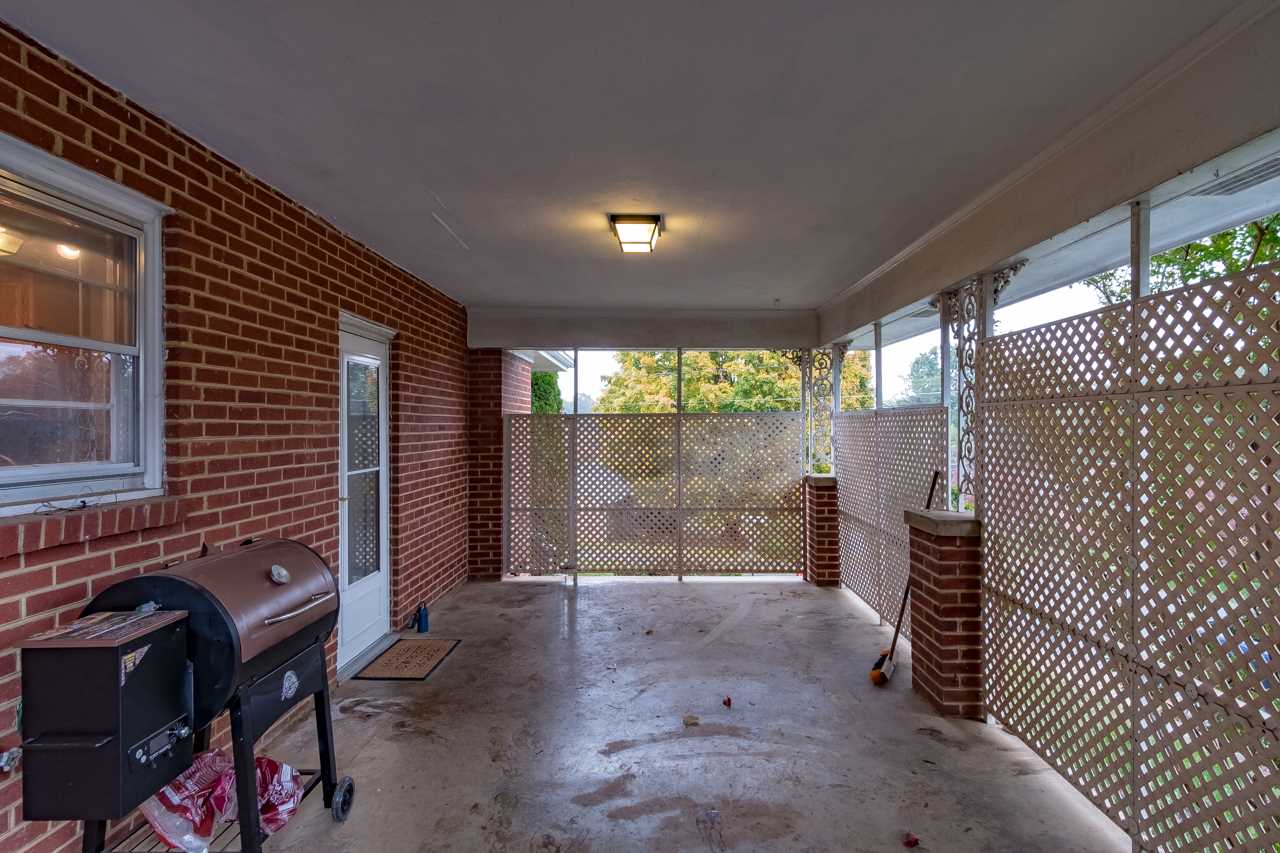 100 Nottingham Road Staunton, VA 24401 - Photo 4 of 50 a backyard of a house with outdoor seating