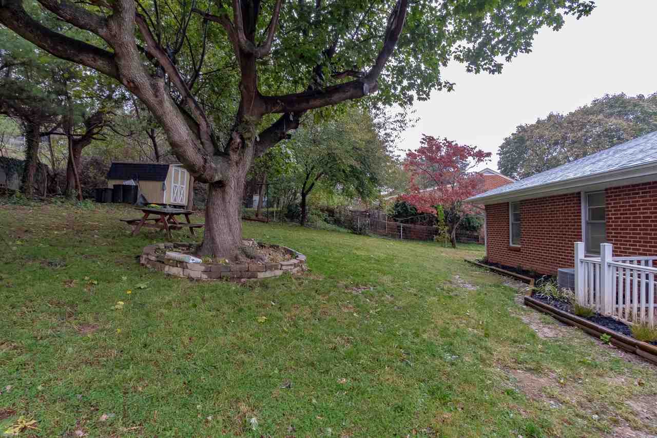 100 Nottingham Road Staunton, VA 24401 - Photo 49 of 50 a view of a backyard with table and chairs and a large tree