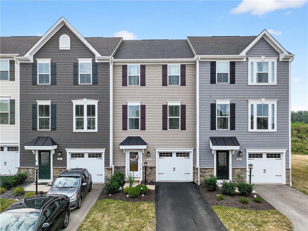 2019 Cade Drive Monaca, PA 15061 - Photo 1 of 37 a front view of a house with garden