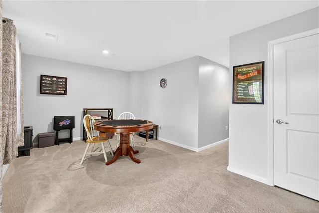 a view of a workspace with furniture