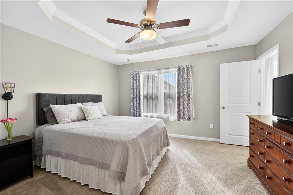 2019 Cade Drive Monaca, PA 15061 - Photo 27 of 37 a bedroom with a bed a window and a flat screen television