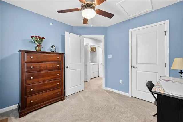 a picture of a bench in front of a building