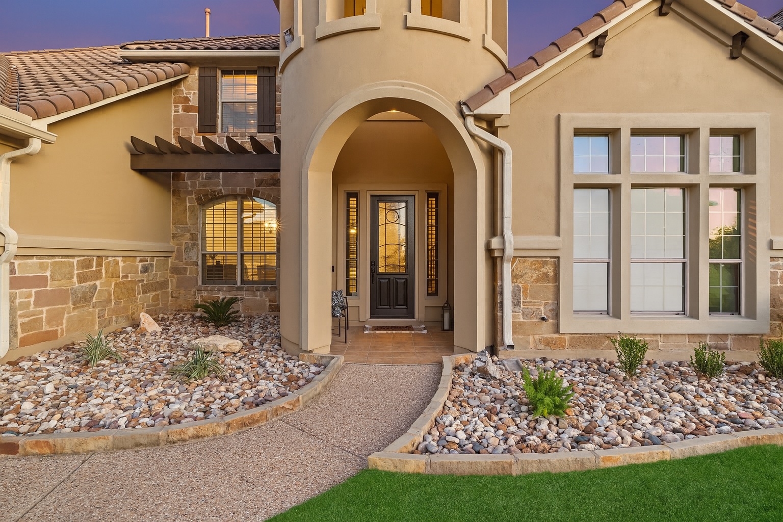 4105 Vail Divide Austin, TX 78738 - Photo 15 of 40 a front view of a house with garden