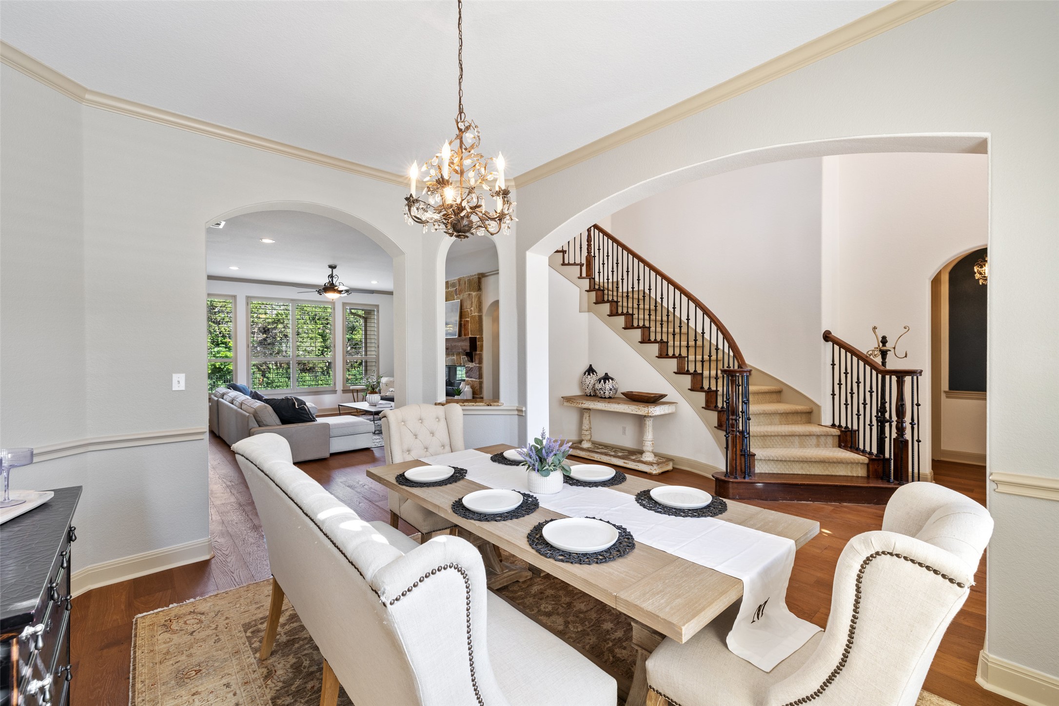 4105 Vail Divide Austin, TX 78738 - Photo 17 of 40 a view of a dining room with furniture window and wooden floor