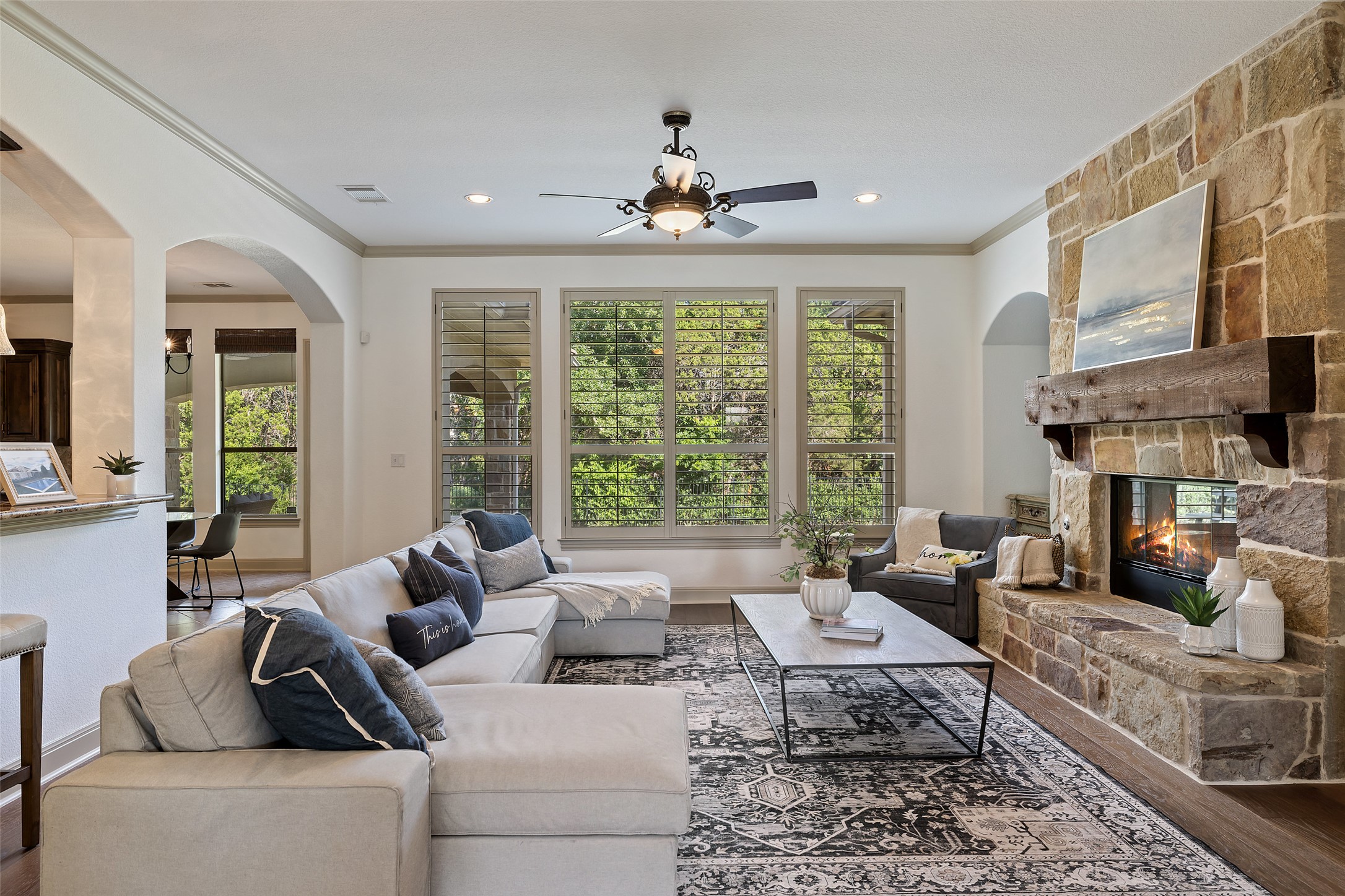 4105 Vail Divide Austin, TX 78738 - Photo 21 of 40 a living room with furniture and a large window