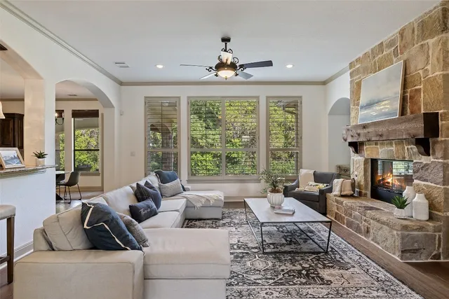 a large kitchen with stainless steel appliances granite countertop a stove and a sink