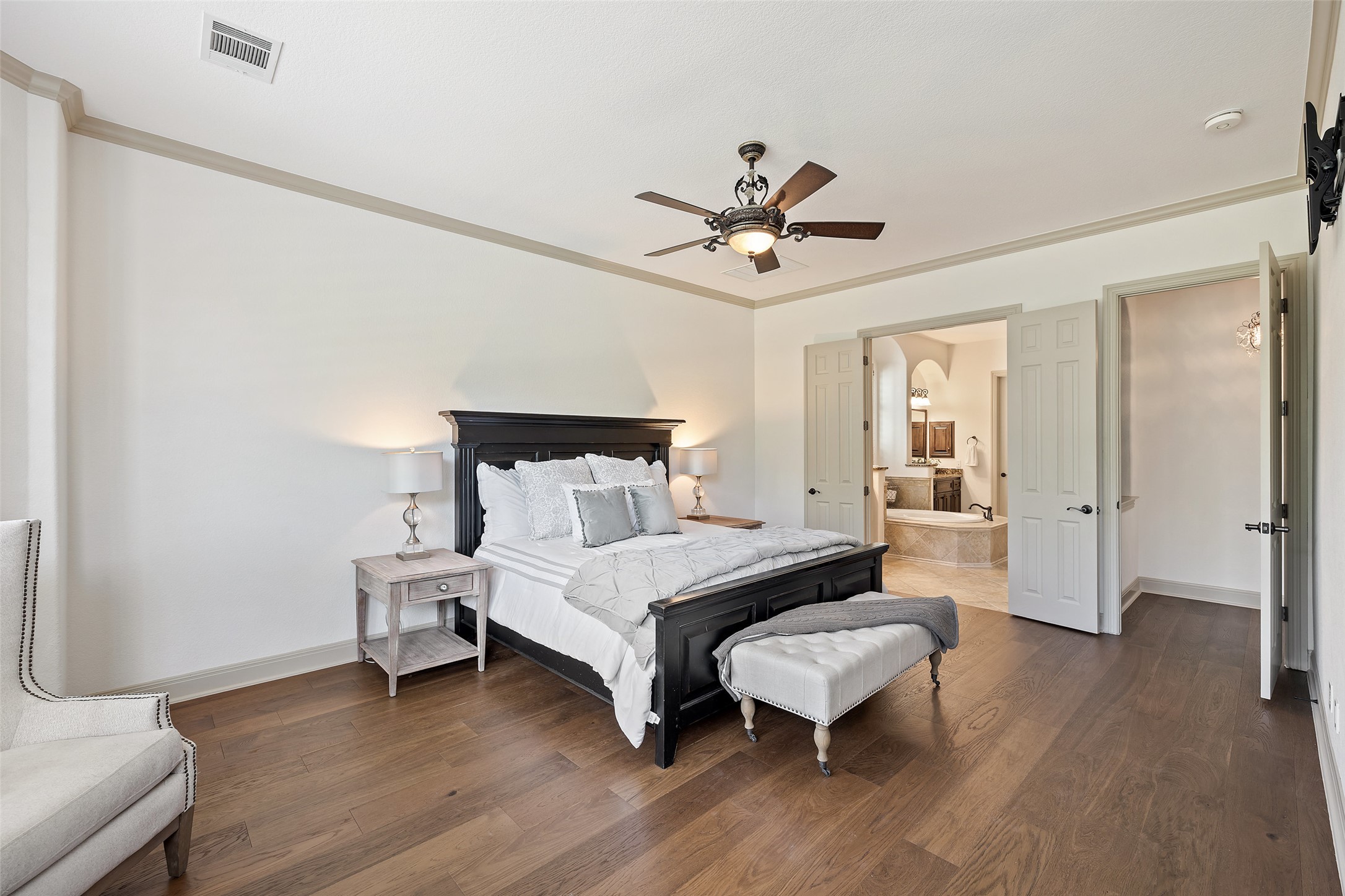 4105 Vail Divide Austin, TX 78738 - Photo 26 of 40 a bedroom with a bed and a table