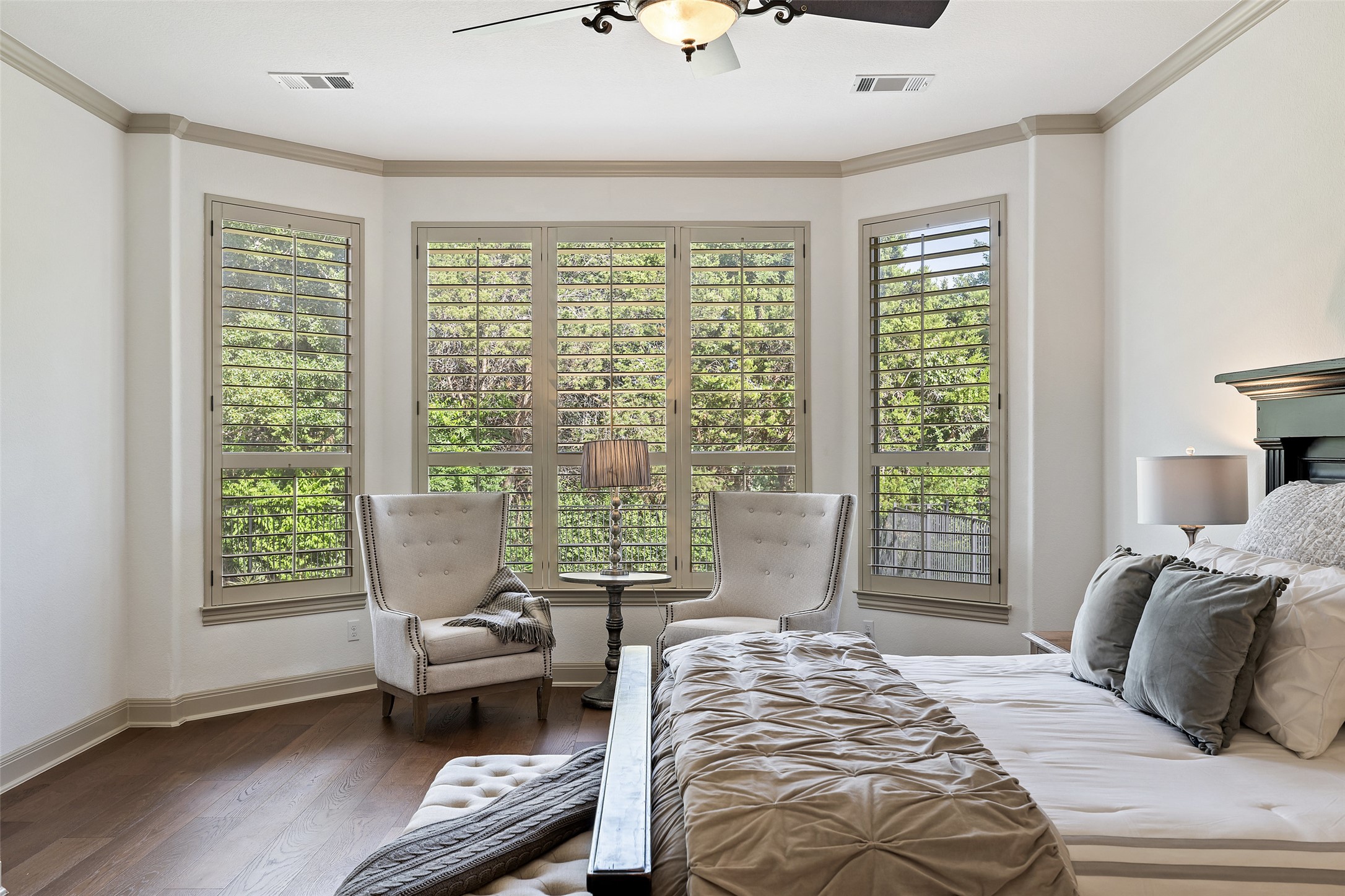 4105 Vail Divide Austin, TX 78738 - Photo 27 of 40 a bedroom with a bed and wooden floor