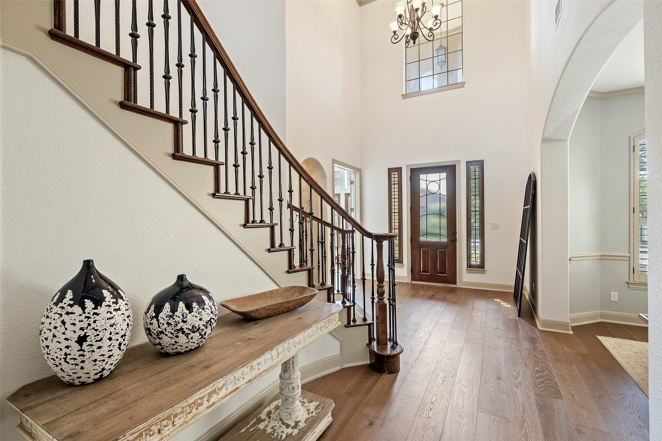 4105 Vail Divide Austin, TX 78738 - Photo 3 of 40 a view of entryway and hall with wooden floor