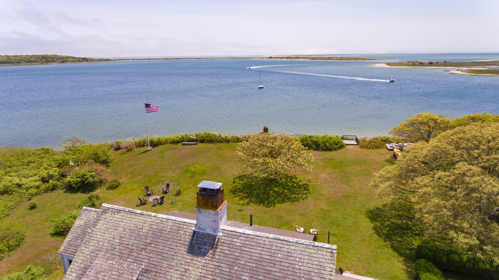55 Sears Point Road Chatham, MA 02633 - Photo 3 of 26 a view of an ocean beach