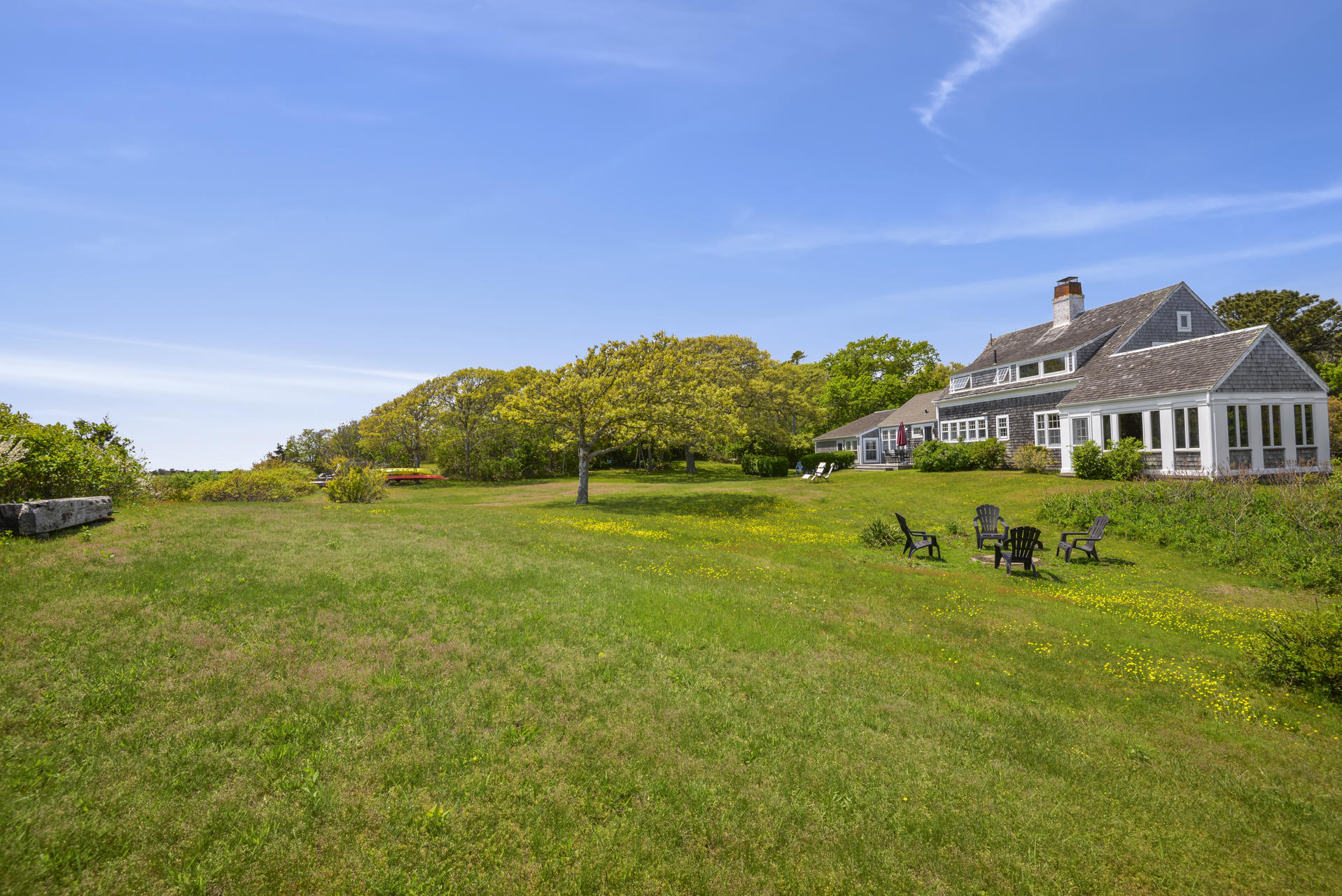 55 Sears Point Road Chatham, MA 02633 - Photo 8 of 26 a view of a house with a big yard