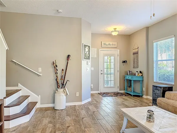 a view of a livingroom with furniture and a fireplace