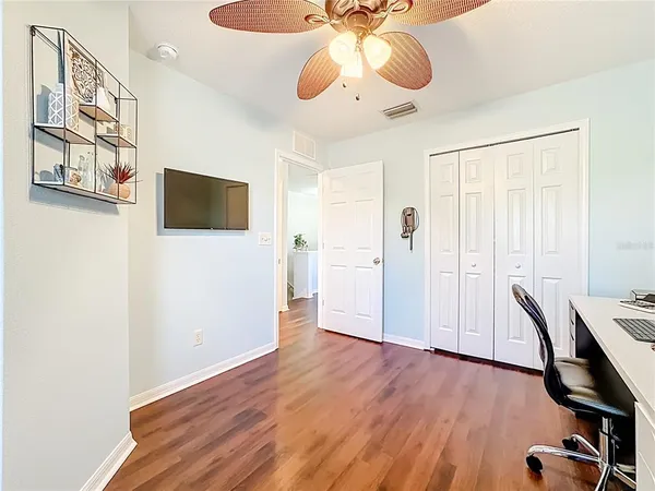 a view of a livingroom with wooden floor