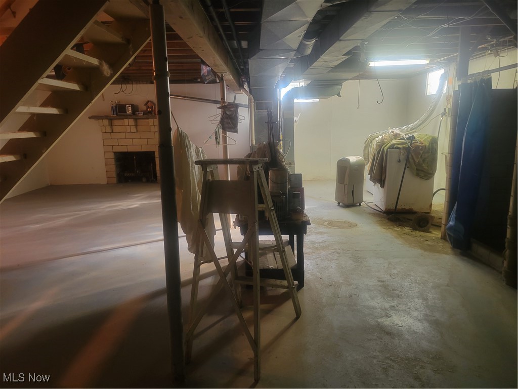 984 Roseland Road Alliance, OH 44601 - Photo 19 of 28 Basement featuring a fireplace