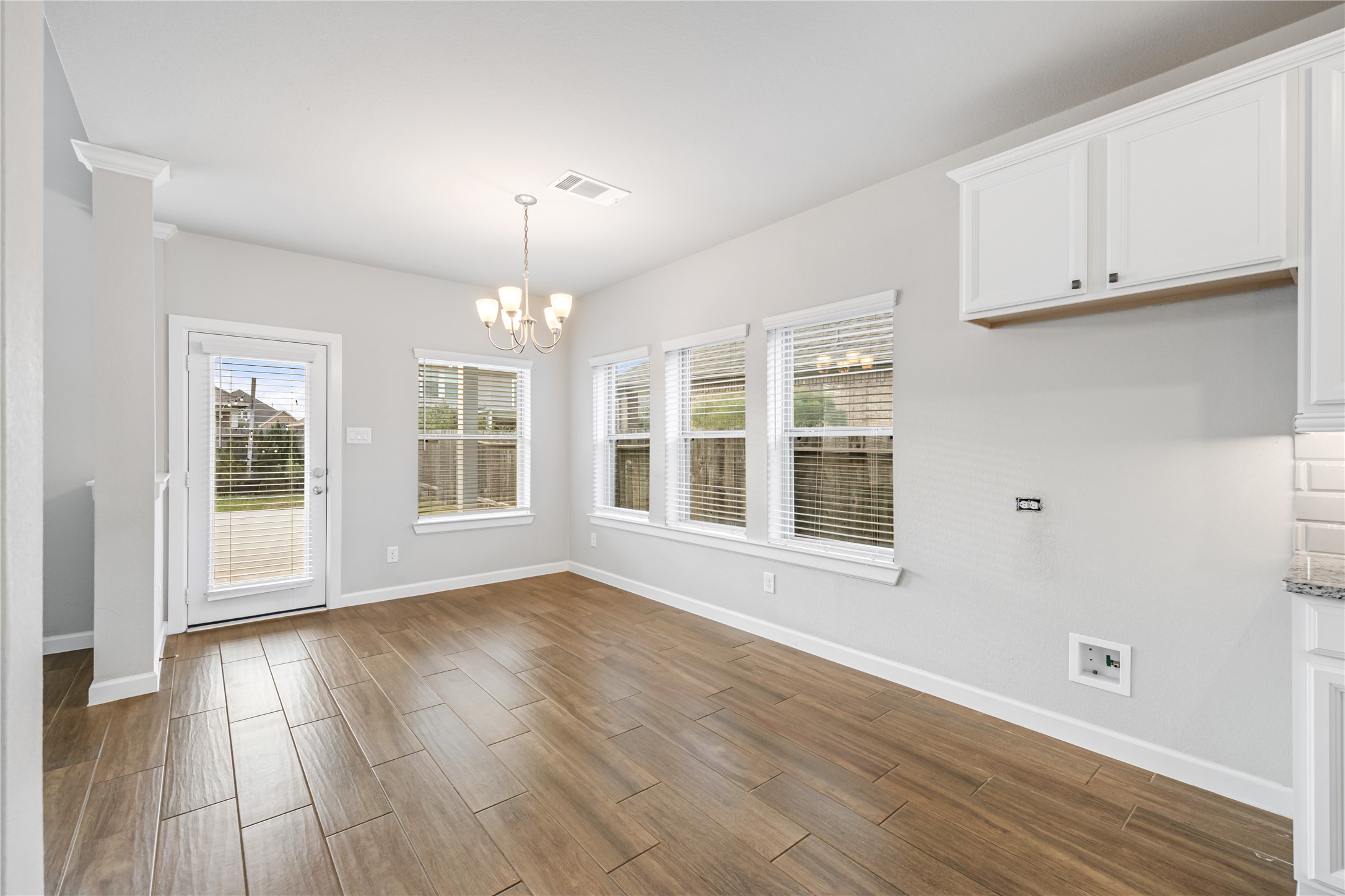 3604 Magnolia Crest Lane Spring, TX 77386 - Photo 18 of 50 a view of an empty room with wooden floor and a window