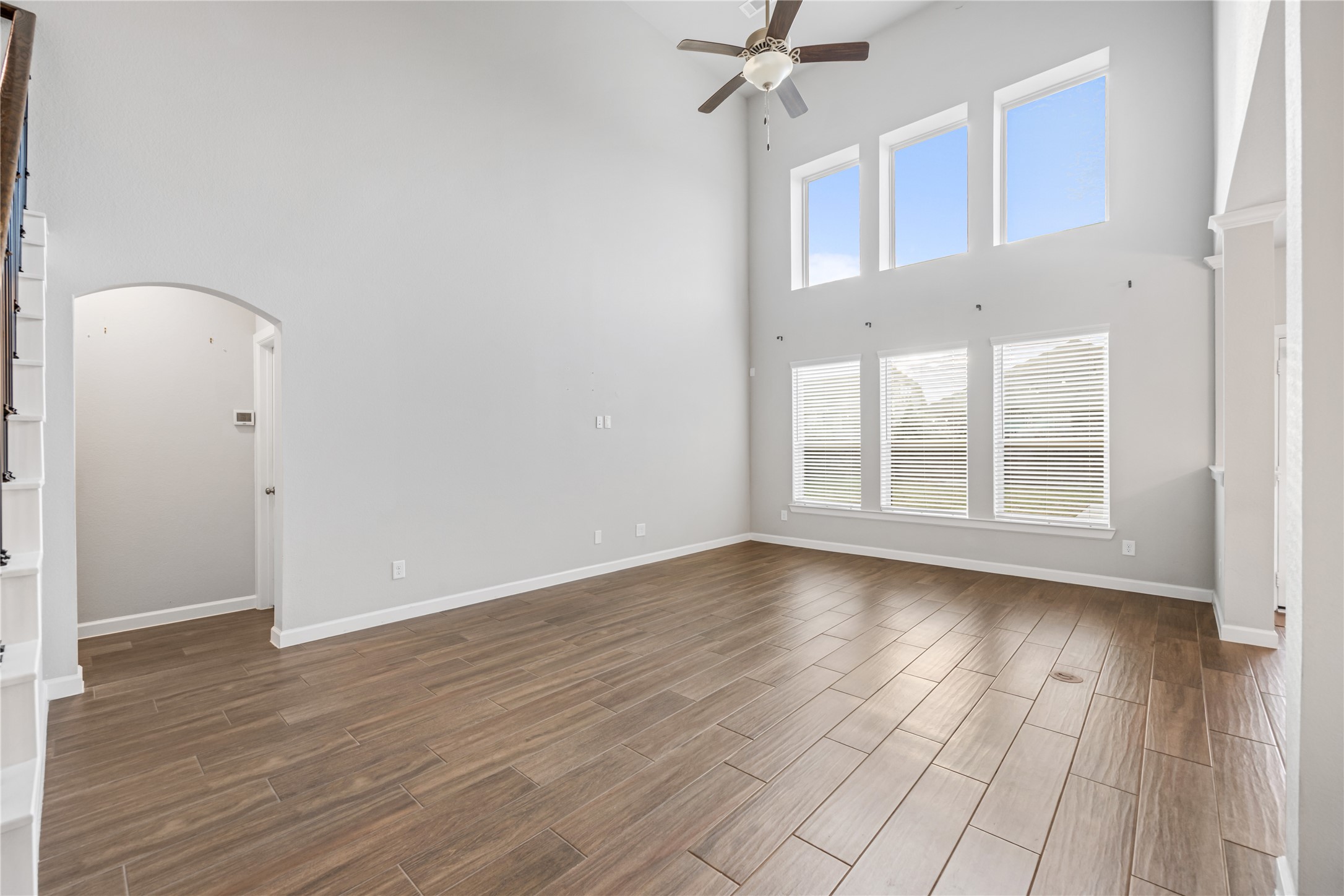 3604 Magnolia Crest Lane Spring, TX 77386 - Photo 21 of 50 a view of an empty room with wooden floor and a window