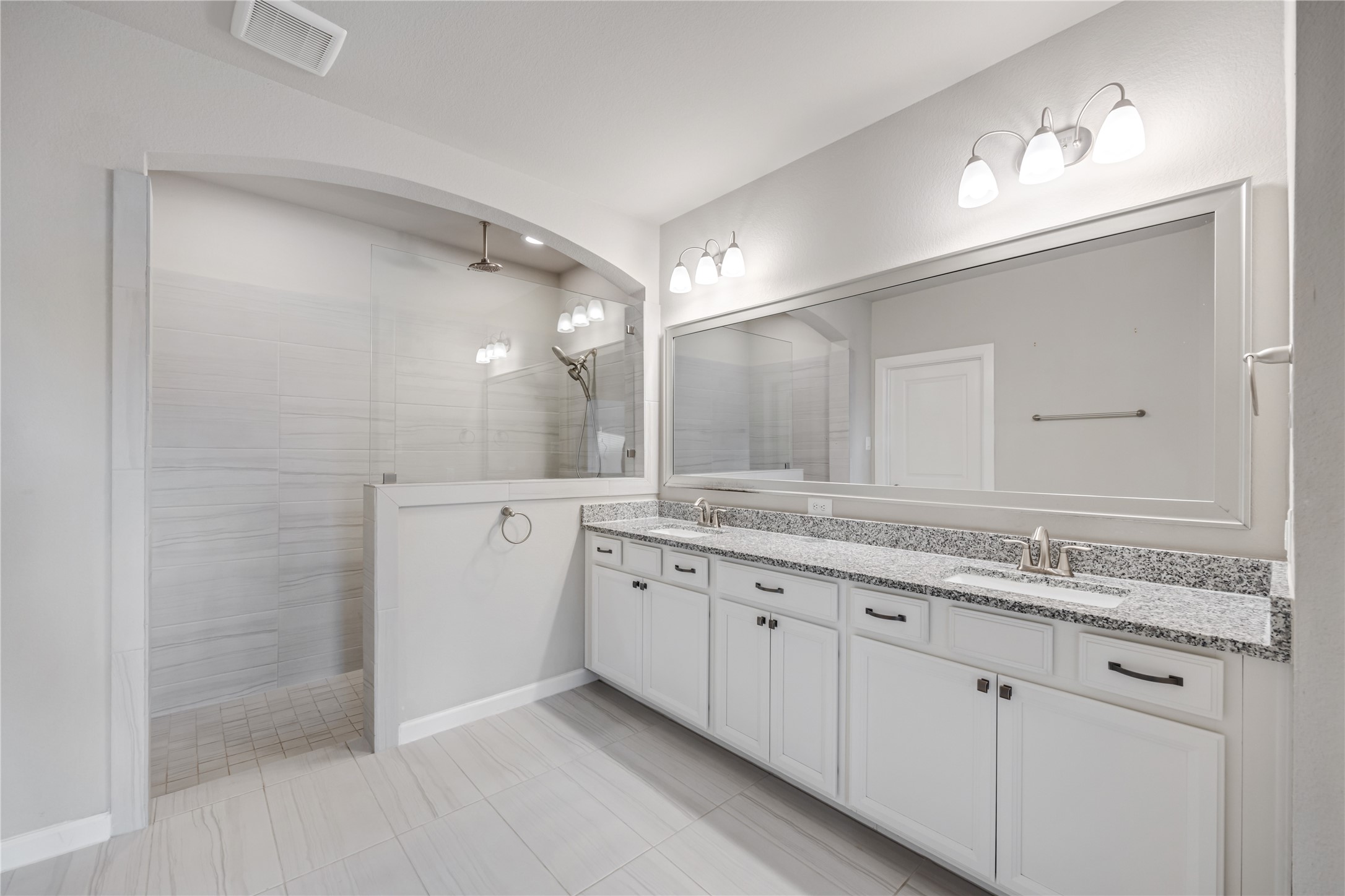 3604 Magnolia Crest Lane Spring, TX 77386 - Photo 28 of 50 a bathroom with a granite countertop sink mirror and double