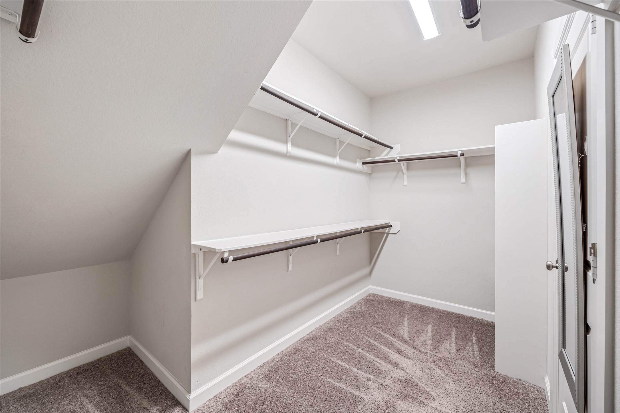 3604 Magnolia Crest Lane Spring, TX 77386 - Photo 31 of 50 a view of walk in closet with empty racks