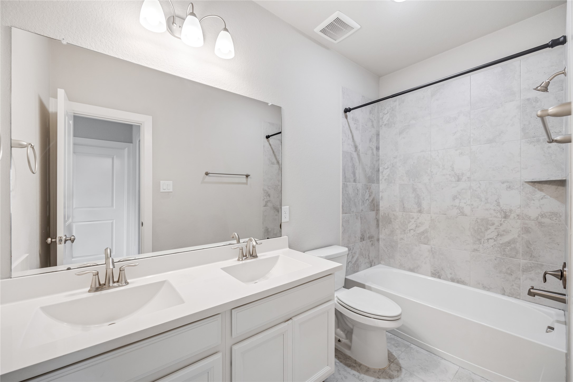 3604 Magnolia Crest Lane Spring, TX 77386 - Photo 34 of 50 a bathroom with a sink toilet and shower