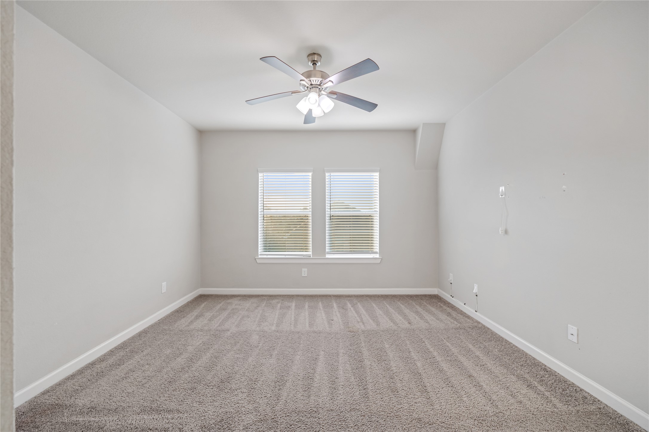 3604 Magnolia Crest Lane Spring, TX 77386 - Photo 43 of 50 an empty room with a window and a fan