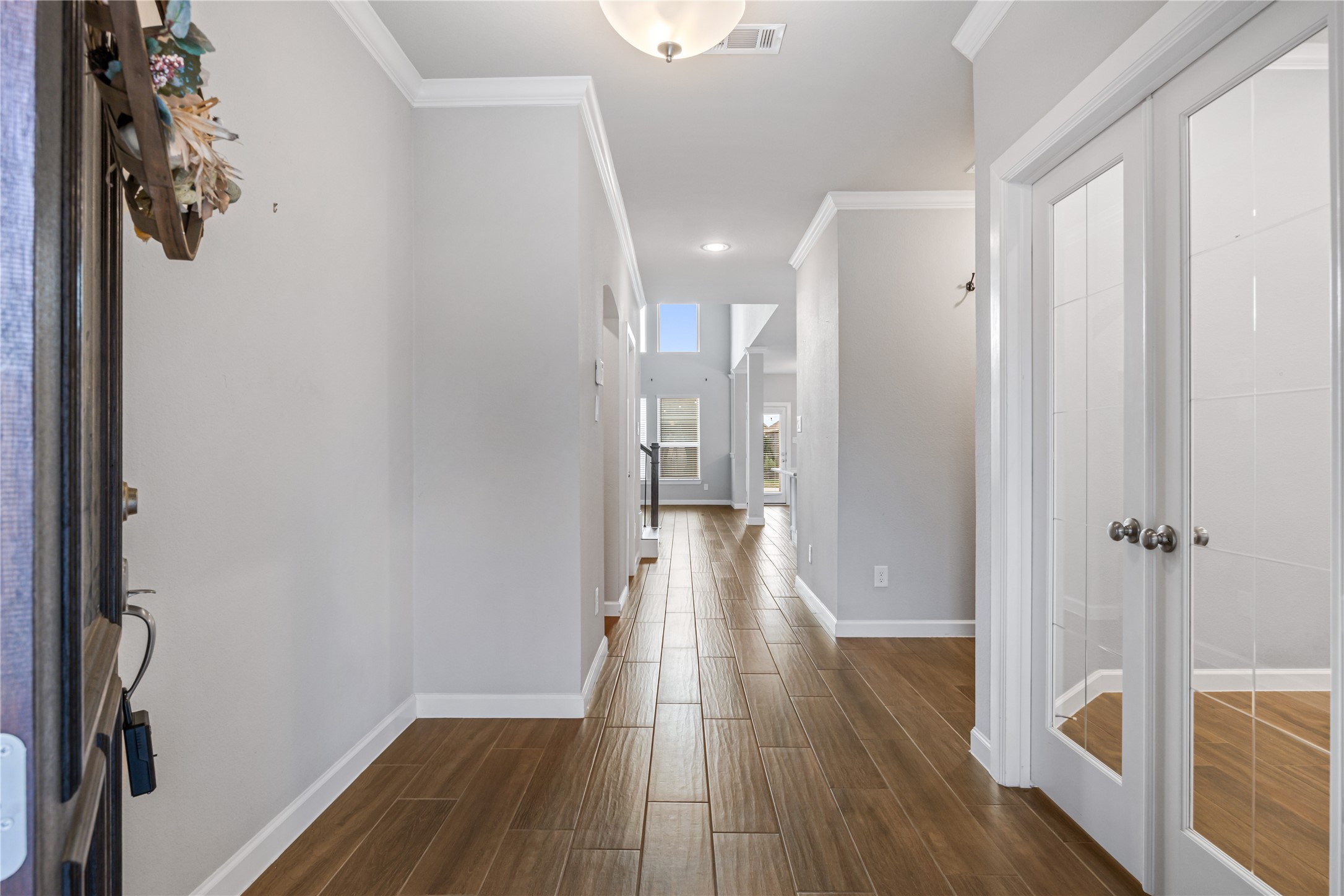 3604 Magnolia Crest Lane Spring, TX 77386 - Photo 5 of 50 a view of a hallway with wooden floor