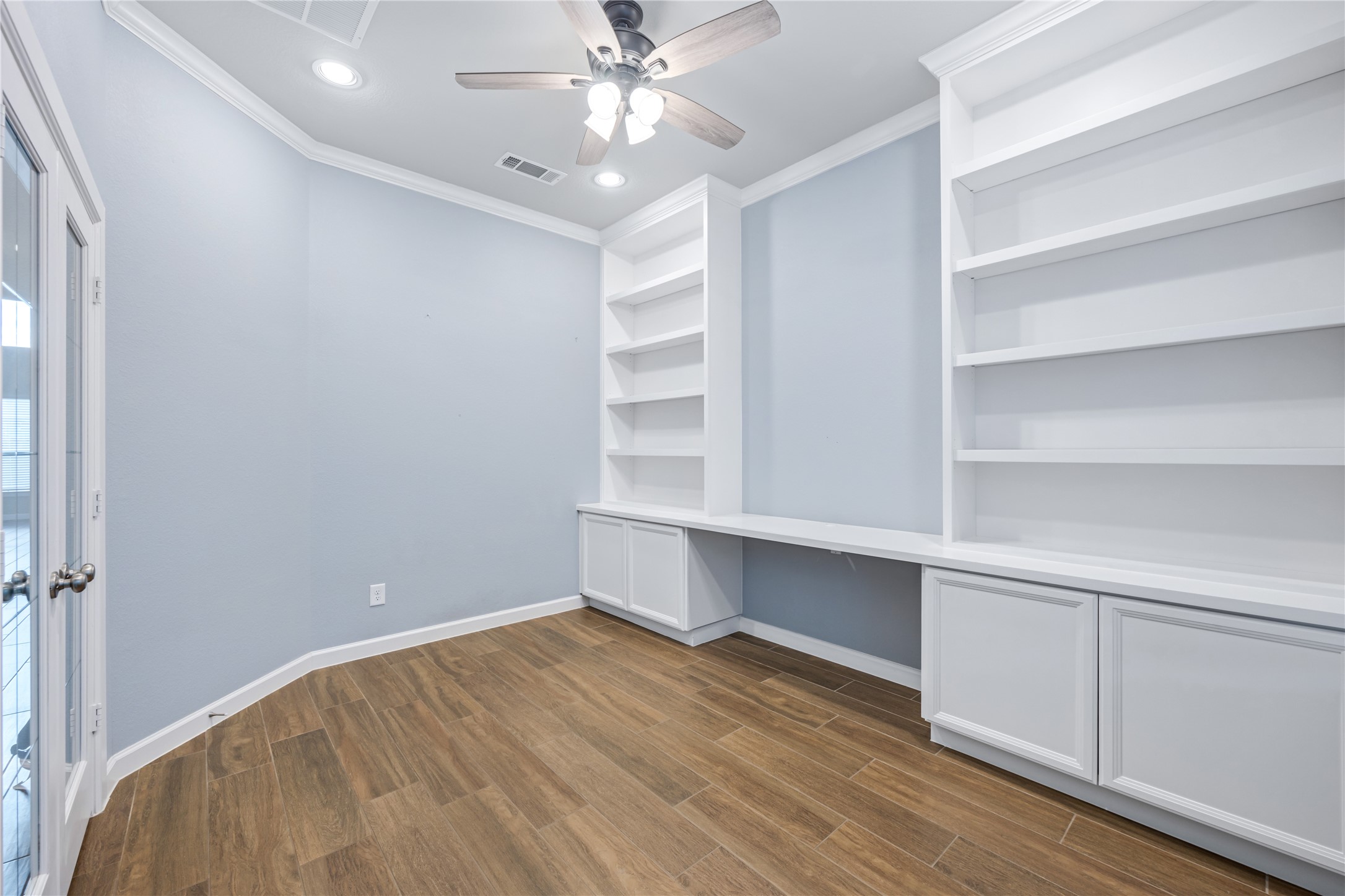 3604 Magnolia Crest Lane Spring, TX 77386 - Photo 8 of 50 a view of an empty room with a window and wooden floor