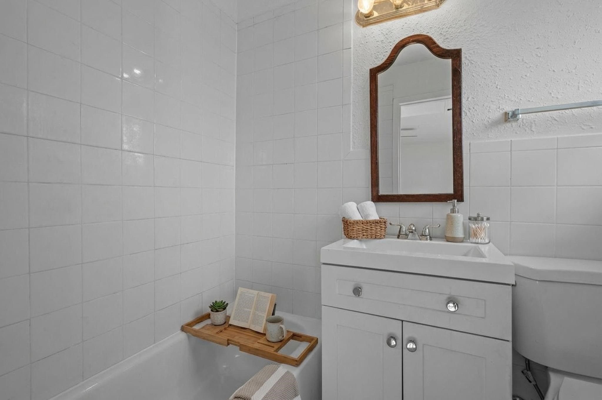 1849 Marshall Street, Unit 9 Houston, TX 77098 - Photo 13 of 22 Bathroom with Linen Storage