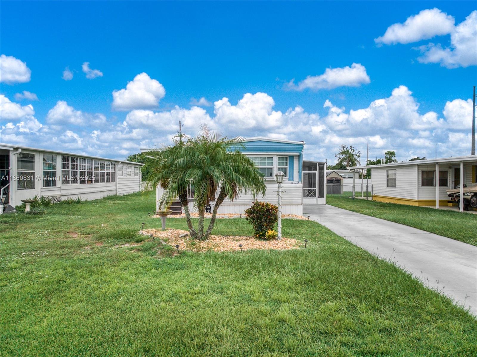 3208 Delaware Avenue Sebring, FL 33870 - Photo 27 of 37 a view of a house with a yard