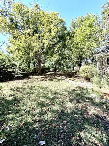 a view of outdoor space and yard