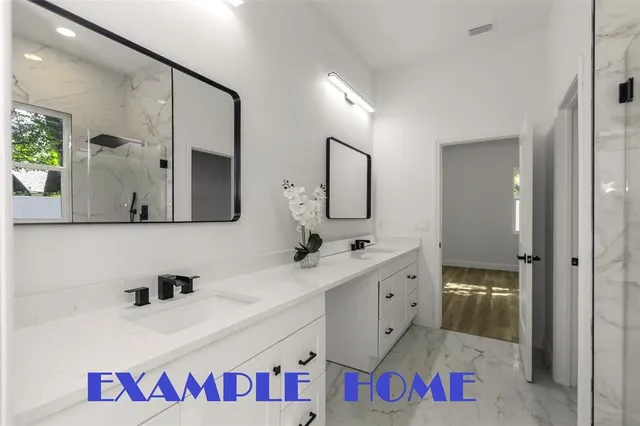 a bathroom with a shower and a sink