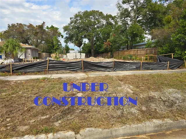 a view of swimming pool with chairs
