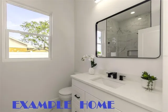 a room that has a bed and a window