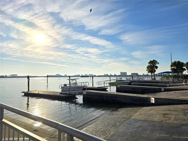 a view of a lake and outdoor seating